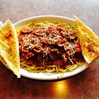 Special: Spaghetti with Italian sausage marinara and garlic bread.